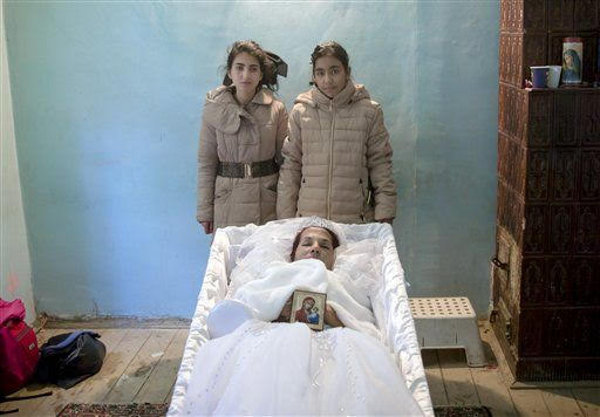 Public Grief And Rage In The Disco Club Fire S Aftermath Two Of Maria Ion S Children 15 Year Old Denise And 11 Alexandra Posed Next To Her Coffin After They Had Requested A Souvenir Picture With Their