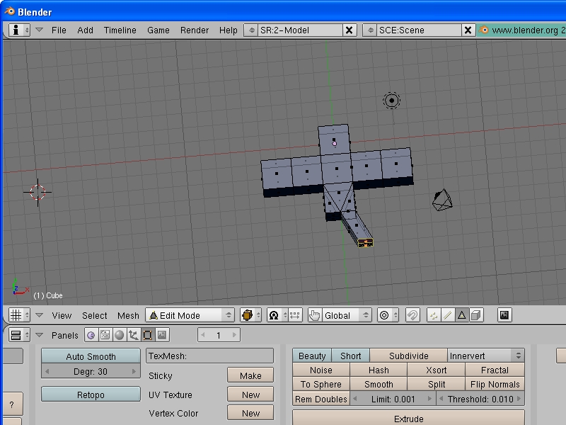 Once we have a bit more of our character done, select the bottom of the torso, and press the subdivide buton in the buttons window to give the bottom of the torso a few more faces: